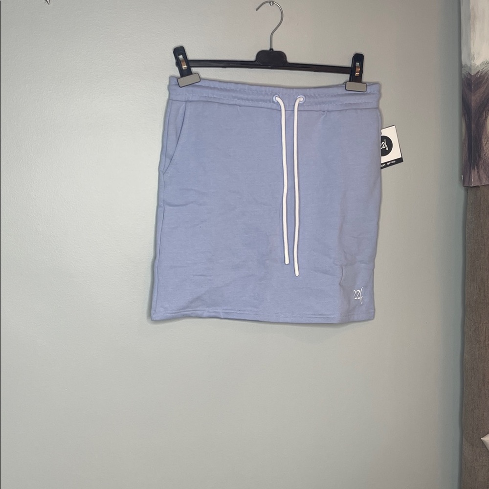New with tags. 22Fresh women’s Athletic skirt in Light Blue